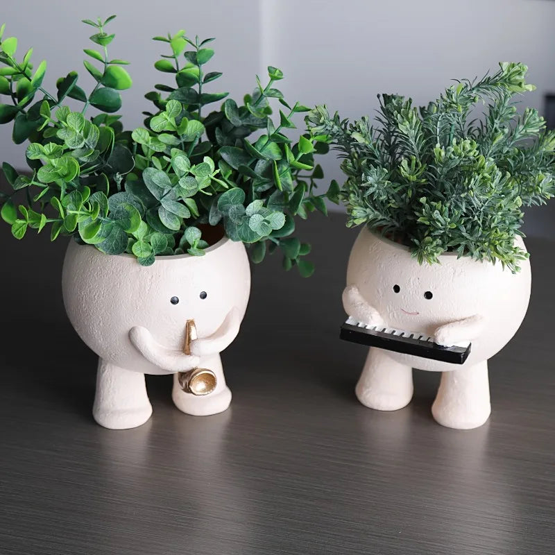 Chậu Hoa Nhựa Trang Trí Hình Nhạc Sĩ